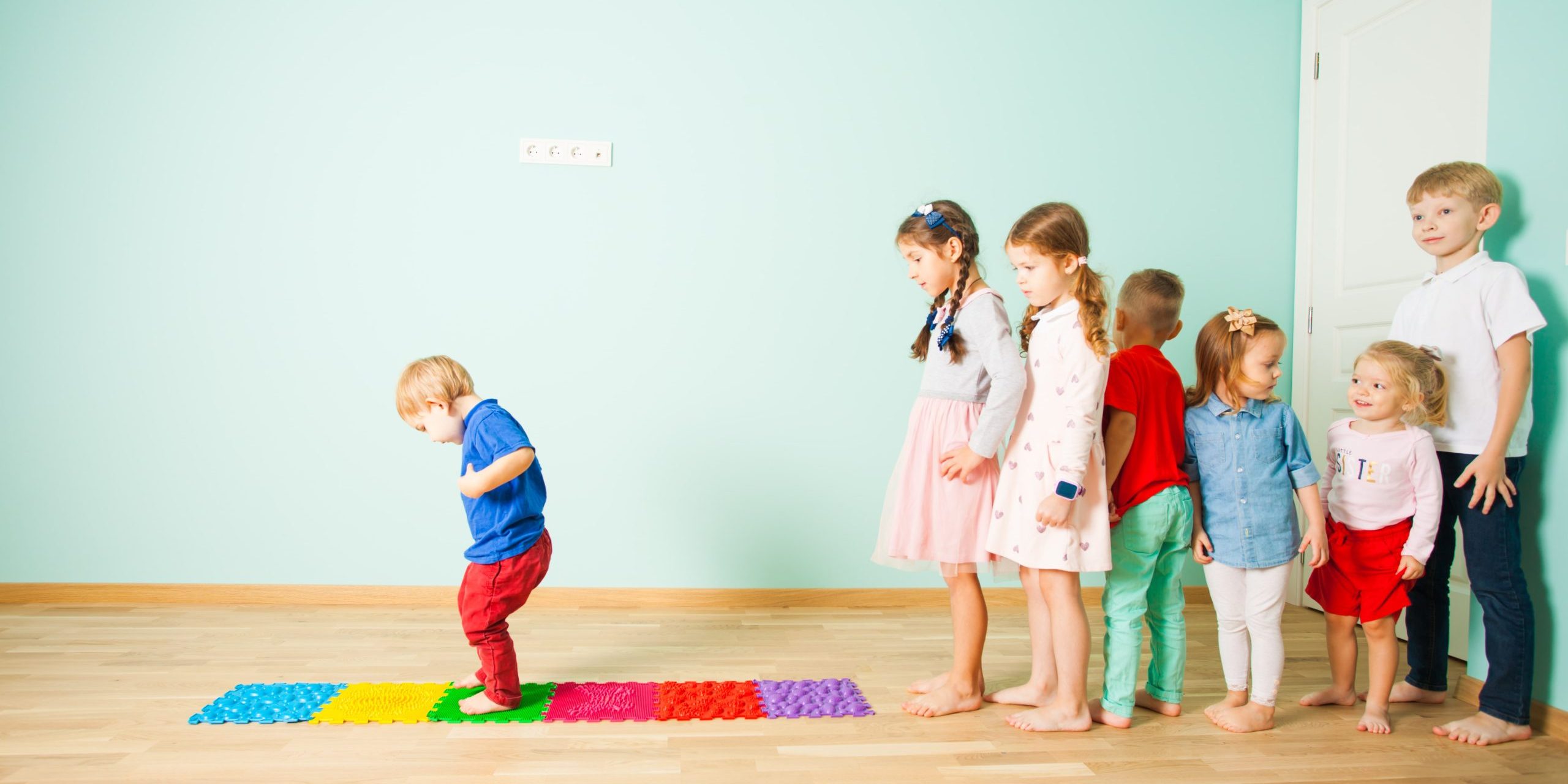 people-standing-wooden-floor-min